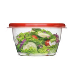 Clear Rubbermaid TakeAlongs container with red lid filled with salad on a white background