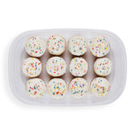 Top-down view of a clear rectangular Rubbermaid container showing a dozen frosted cupcakes inside