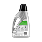 Rear view of silver Rug Doctor by BISSELL PET cleaner bottle showing back label and usage instructions