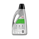 Rear view of a silver Rug Doctor Bissell PET carpet cleaner bottle showing product instructions and barcode on the label