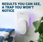 Safer Home plug-in fly trap shown mounted in an outlet with towels and a soft-lit background