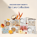 Staged product assortment of Scent Theory Air Care Collection boxes with fruit and botanical props and promotional headline