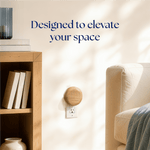 Styled room scene showing a wood-grain plug-in diffuser in an outlet with headline designed to elevate your space