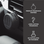 Close-up of a black Scent Theory car vent diffuser clipped into an air vent with icons listing premium fragrance and long-lasting scent.
