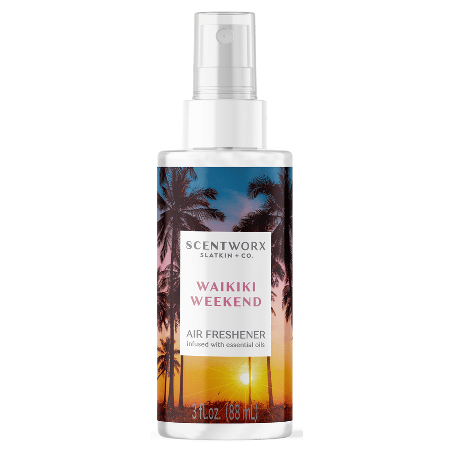 ScentWorx Waikiki Weekend air freshener spray bottle with palm-tree sunset label and spray nozzle