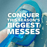 Close-up of a blue Scotch-Brite dishwand scrubbing a surface with bold white text 'CONQUER THIS SEASON'S BIGGEST MESSES'