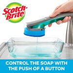 Hand holding a Scotch-Brite dishwand dispensing liquid into a glass baking dish with brand logo and soap-control message.