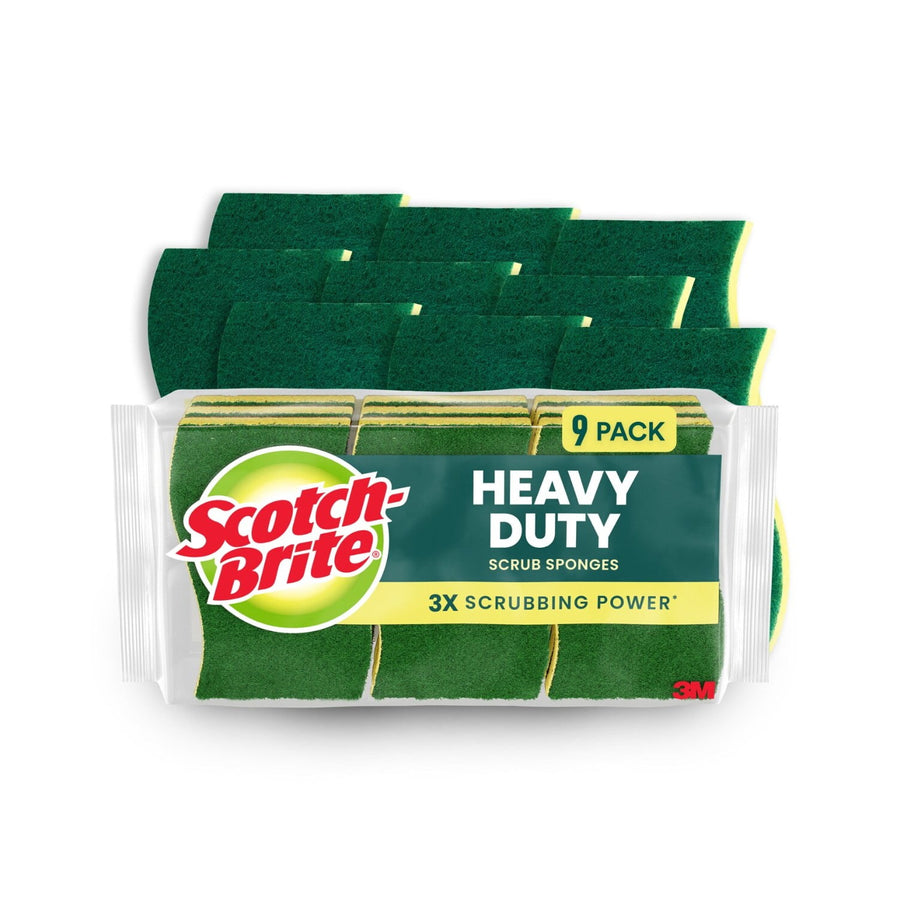 Packaged Scotch-Brite Heavy Duty scrub sponges in clear plastic showing green scrubbing side and yellow sponge core, nine-pack label