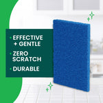 Blue Scotch-Brite non-scratch pad displayed upright with text callouts stating effective, zero scratch, durable over a soft kitchen background.