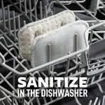 Two Scotch-Brite Greener Clean pads placed in a dishwasher rack with bold text about sanitizing in the dishwasher