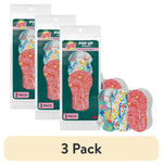 Three packaged Scotch-Brite Pop Up sponge pouches with three colorful floral sponges displayed beside them.