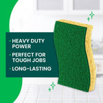 Close-up of a Scotch-Brite heavy duty green scrub sponge standing upright with key benefit bullet points beside it.