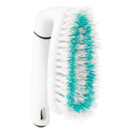 Side view of a white Scotch-Brite scrub brush showing rows of white and teal bristles against white background