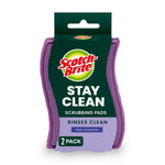 Single Scotch-Brite Stay Clean scrubbing pads 2-pack package with green header and purple pad visible at the edges.