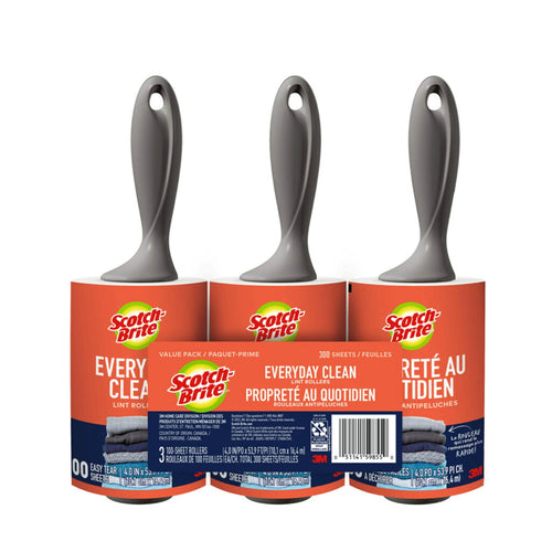 Three Scotch-Brite lint rollers with gray handles and orange branded sleeves shown side-by-side on a white background.
