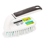 White Scotch-Brite scrub brush with gray handle grip and visible product label on brush head