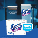 Scott 1000 branded toilet paper roll on a holder with packaged multi-roll pack in foreground and 'now stronger' graphic