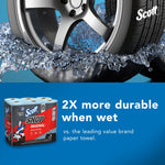Promotional image showing a vehicle wheel splashing water and a Scott Shop Towels pack with ‘2X more durable when wet’ claim