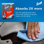 Scott Shop towel pack with headline 'Absorbs 2X more' and hand wiping a spill with a blue towel