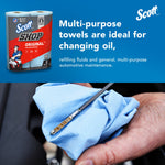 Scott Shop two-roll pack with copy about using towels for changing oil and a hand holding a blue towel