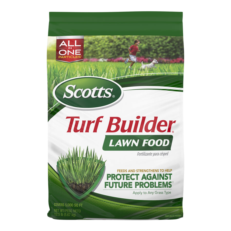 Front-facing bag of Scotts Turf Builder lawn food with large logo, grass graphic and product text on white and green packaging.