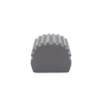 End-on view of a gray ribbed foam sponge showing scalloped top and flat base.