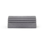 Gray foam Damp Duster sponge shown on its side with horizontal ribbed texture.