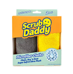 Packaged Scrub Daddy microfiber cloths in yellow and gray visible through branded box