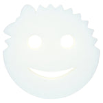 White smile-faced Scrub Daddy style sponge with cut-out eyes and mouth on a plain background