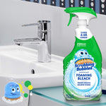 Scrubbing Bubbles Foaming Bleach bottle positioned on a bathroom sink counter beside a faucet, product label visible