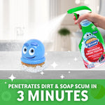 Scrubbing Bubbles bottle spraying foam toward a blue smiling scrub brush on a countertop, text about penetrating dirt and soap scum