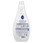 Close rear view of Seventh Generation fabric softener bottle showing detailed back-label text and icons