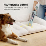 Shark portable stain cleaner being used on a pet bed while a dog looks on; text highlights odor neutralization.