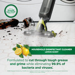 Shark VacMop head spraying cleaning solution on tiled floor with lemon graphic and product benefit text.
