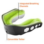 Lemon-lime mouthguard image with labeled features showing integrated breathing channels and convertible tether