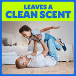 Photo of a person playing with a child on a clean carpet under headline ‘Leaves a Clean Scent’ and bright graphic accents
