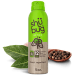 Shubug Active green aerosol can displayed with bay leaves and peppercorns suggesting natural ingredients