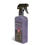 Angled view of a purple Shubug bed bug killer bottle with black trigger nozzle on white background showing embossed side logo