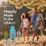 Outdoor lifestyle scene with a family walking and two Shübug insect repellent bottles plus 'Happily Made in the USA' text.