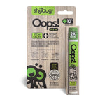 Shübug Oops! pen in retail blister packaging on a wood-texture backing with branding and product callouts.