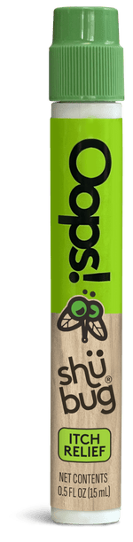 Close-up vertical view of a Shübug Oops! pen with green cap and wood-texture label reading itch relief.
