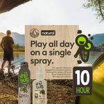 Lakeside outdoor scene with Shübug bottles and a wood-textured panel proclaiming 'Play all day on a single spray' and a 10 hour badge.