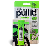 Retail blister-packaged Shübug Pull It! showing product visible on wood-texture backing with branding and bite relief callouts