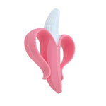 Side-angle of a pink Nuby NanaNubs banana-shaped infant toothbrush showing curved handles