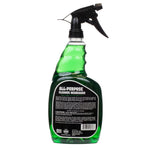 Rear view of a green Simoniz all-purpose cleaner spray bottle showing the product information label and barcode.