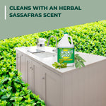 Simple Green gallon placed on a kitchen island set against a leafy green background with scent claim text