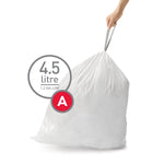 Hand holding tied white drawstring trash bag with a circular 4.5 litre/1.2 gallon badge and red 'A' marker