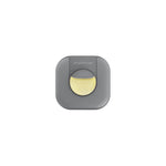 Close-up of a square gray simplehuman Odorsorb pod with a yellow circular insert centered