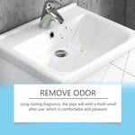 White ceramic sink with faucet and small green leaf graphics above the drain and a blue panel reading 'REMOVE ODOR' with supporting text.