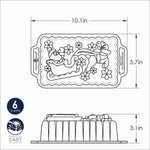 Line-art dimension diagram of Nordic Ware Santa sleigh loaf pan showing 10.1in by 5.7in footprint and 3.1in height